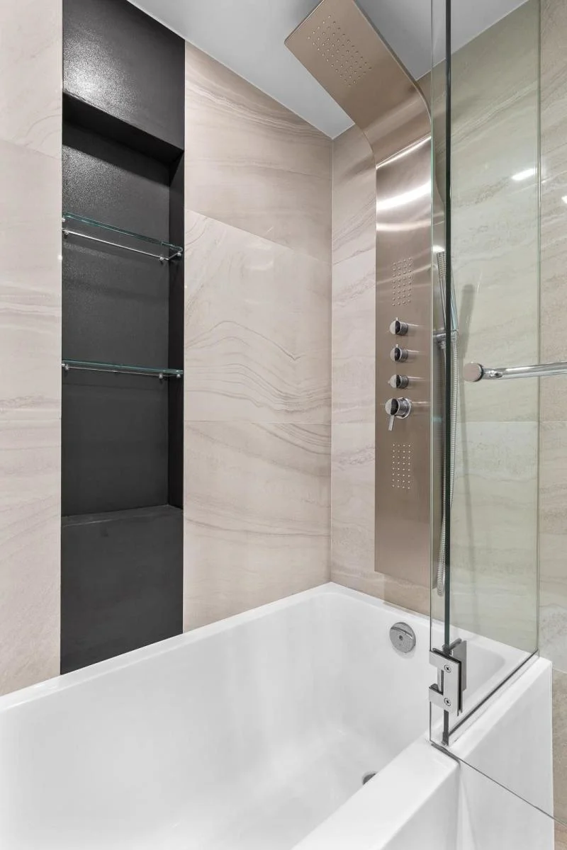 Contemporary open-concept living and dining space with tray ceiling — residential construction Richmond by True Vision Construction